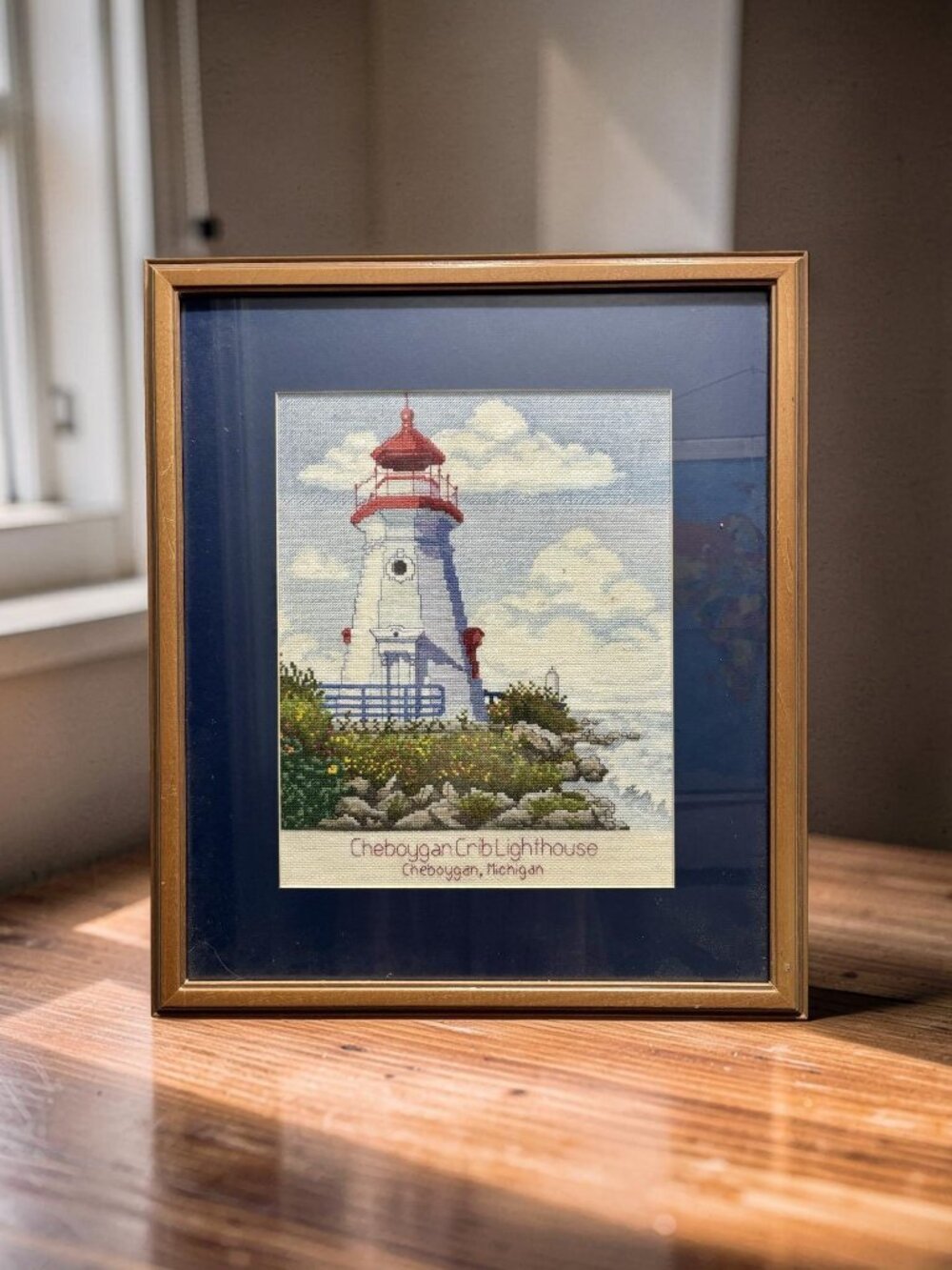 Framed Cross-Stitch Cheboygan Crib Lighthouse Artwork - Nautical Wall Decor - Picture 2 of 6